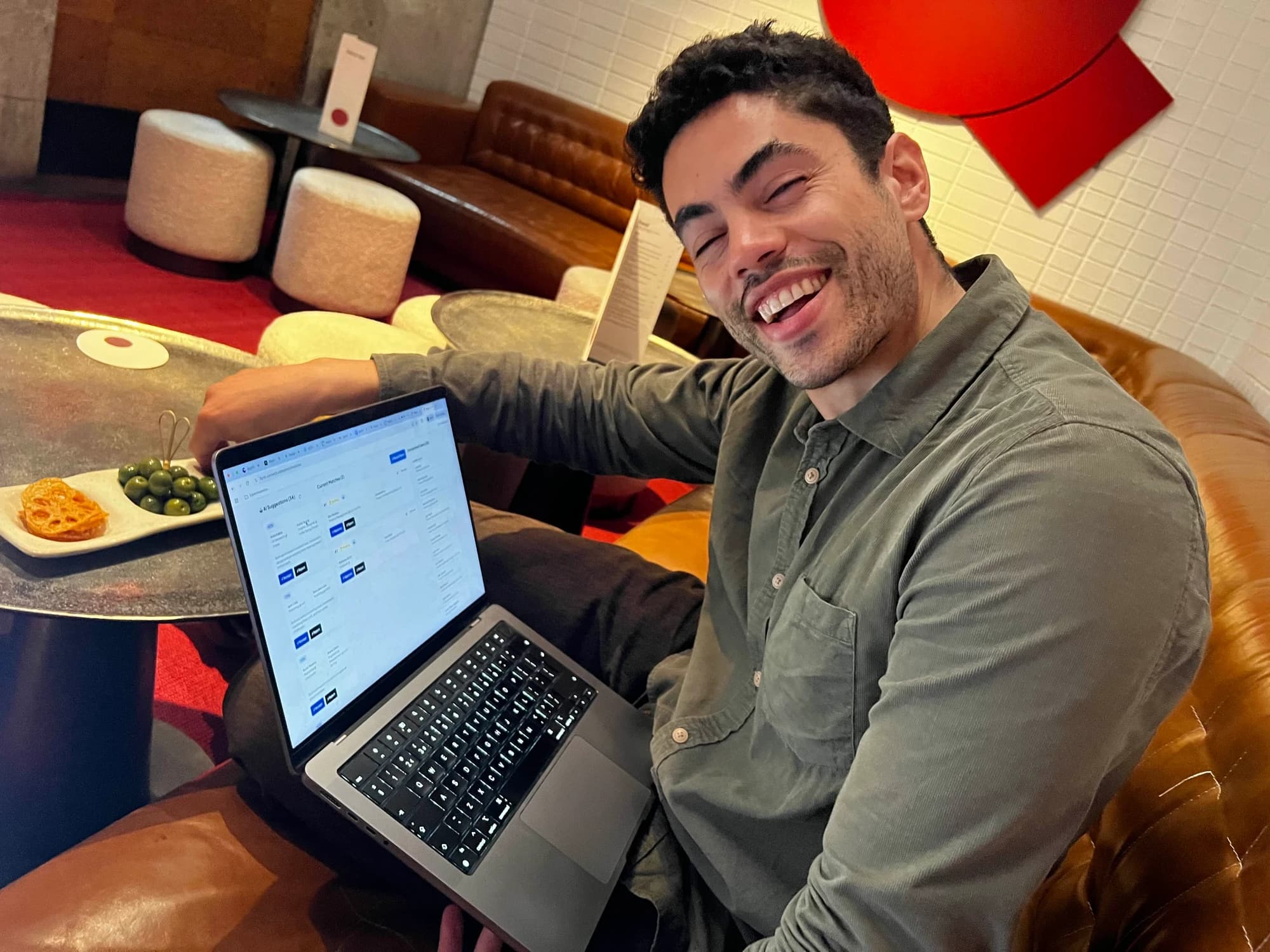 flynt-cofounder-ivan-hunched-in-front-of-laptop